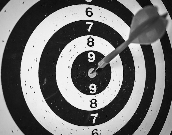 A dart at the center of a target